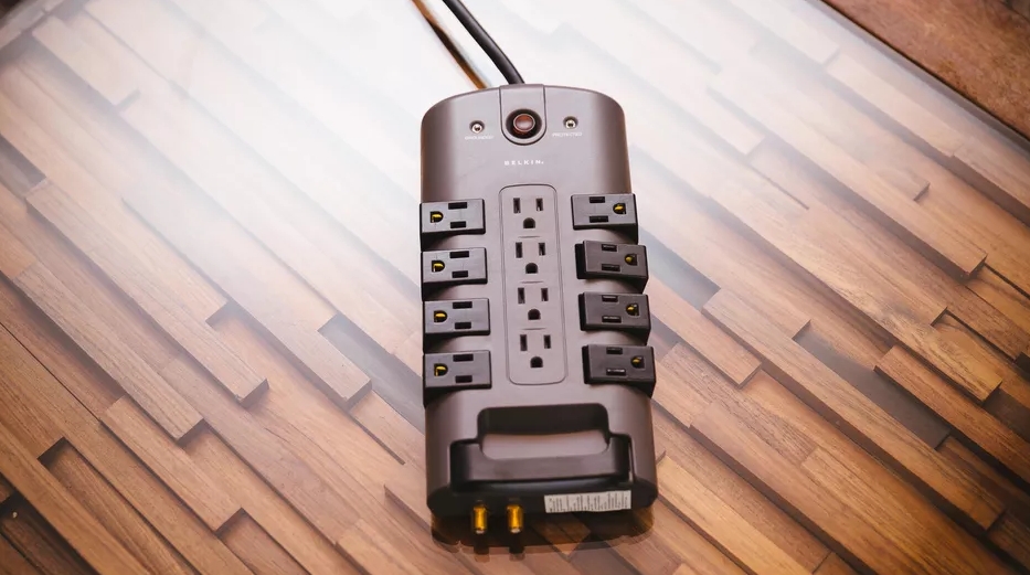 What is a surge protector and why do I need one for my laptop?
